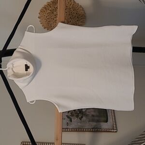 Sophisticated White Sleeveless Ribbed Knit Turtleneck Top